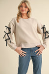 Textured Sweatshirt with Bow Sleeves